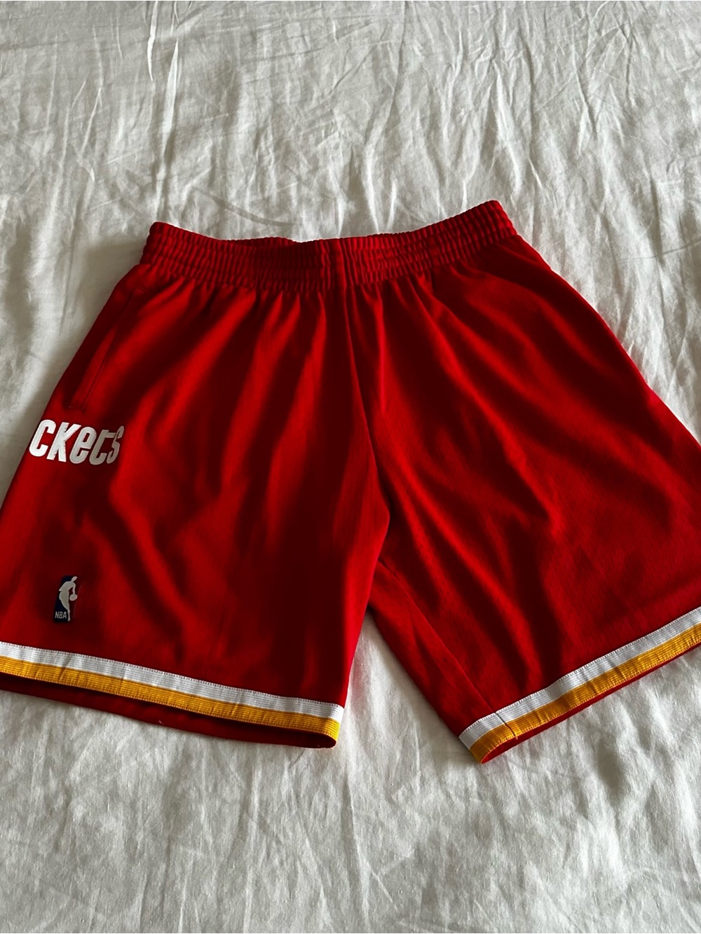 Mitchell & Ness Houston Rockets Red Athletic Shorts with White and Yellow Trim